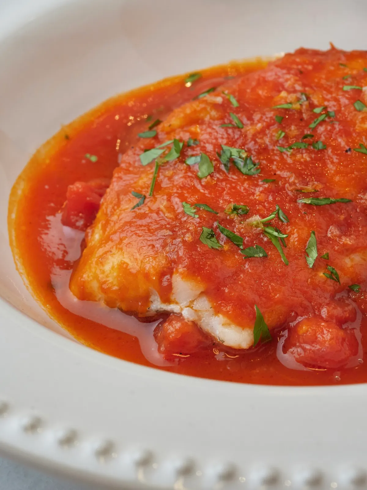 Bacalao con tomate en La Pescadería, bar de pescados en Sevilla